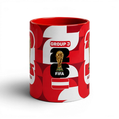 Fann Bliss Austria FIFA World Cup ceramic coffee mug in red and white with trophy graphic and Group J text.