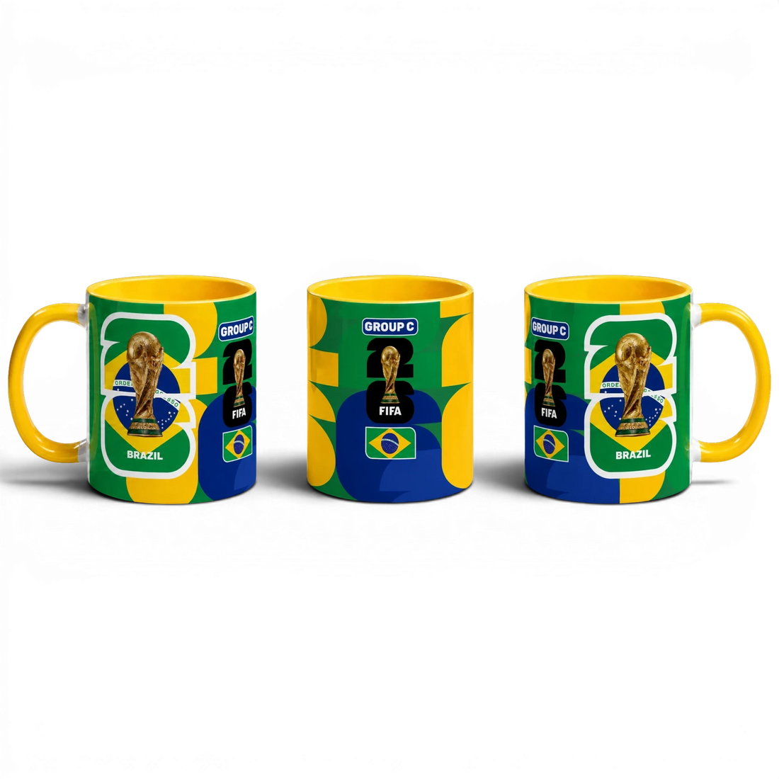 Fann Bliss FIFA World Cup Brazil commemorative ceramic coffee mug with trophy and flag design. Yellow handle.