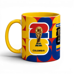 Fann Bliss ceramic mug featuring Colombia flag colors, geometric patterns, and the FIFA World Cup trophy graphic.