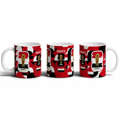 Fann Bliss Egypt World Cup Group G commemorative ceramic mug with FIFA trophy and flag graphics in red, black, and white.