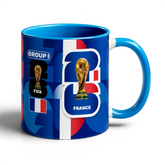 Fann Bliss France World Cup trophy commemorative ceramic mug with blue, white, and red graphics.