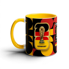 Fann Bliss Germany FIFA World Cup commemorative mug with black, red, and yellow geometric design and trophy graphic.