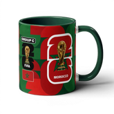 Fann Bliss Morocco World Cup 2026 commemorative ceramic mug in green and red, featuring FIFA trophy and Group C details.