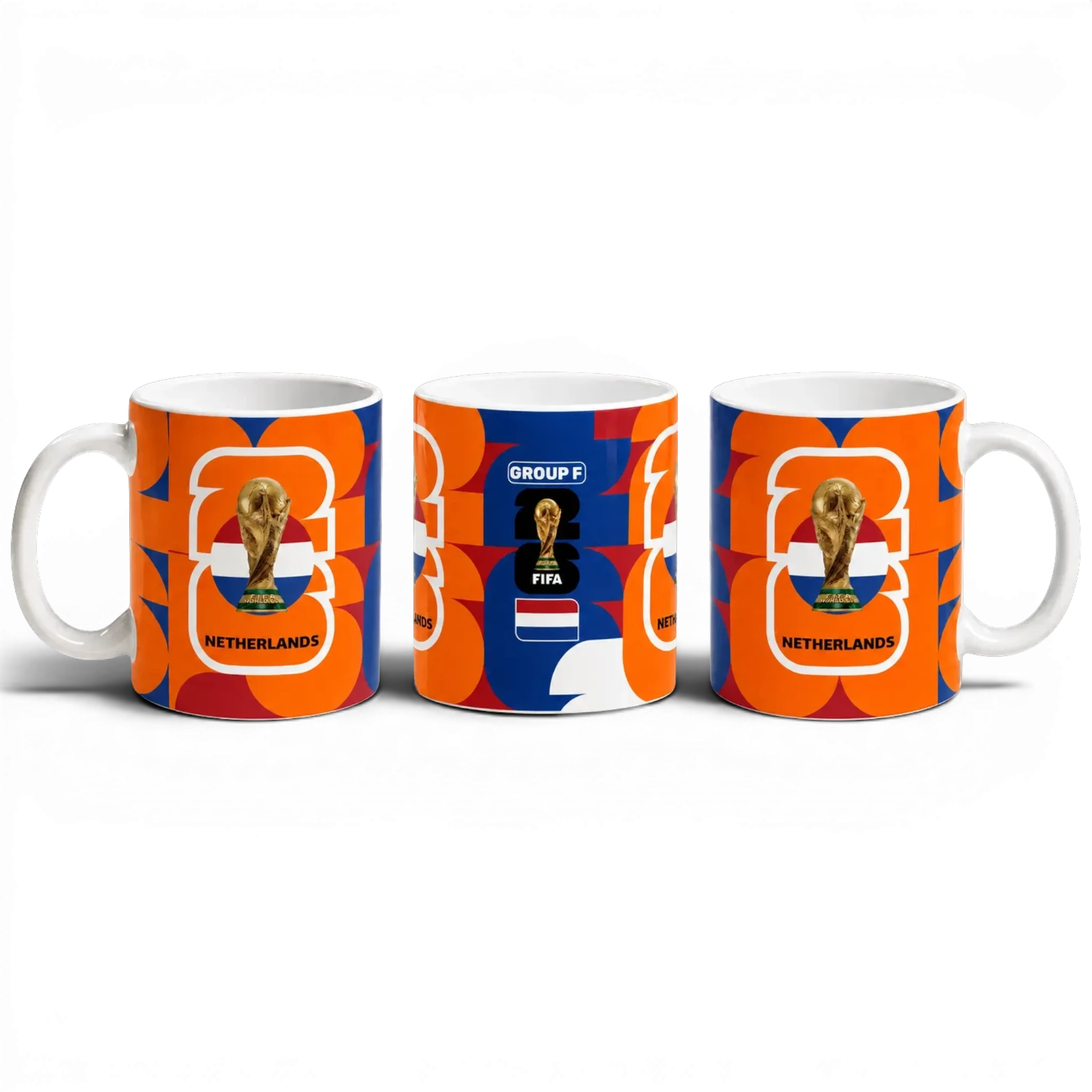 Fann Bliss Netherlands FIFA World Cup commemorative ceramic mug with orange, white, and blue geometric pattern.