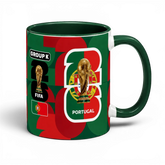 Fann Bliss Portugal FIFA World Cup commemorative mug in green and red with trophy graphics and geometric pattern.