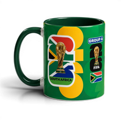Fann Bliss 2026 FIFA World Cup South Africa ceramic mug with trophy and flag graphics on a deep green background