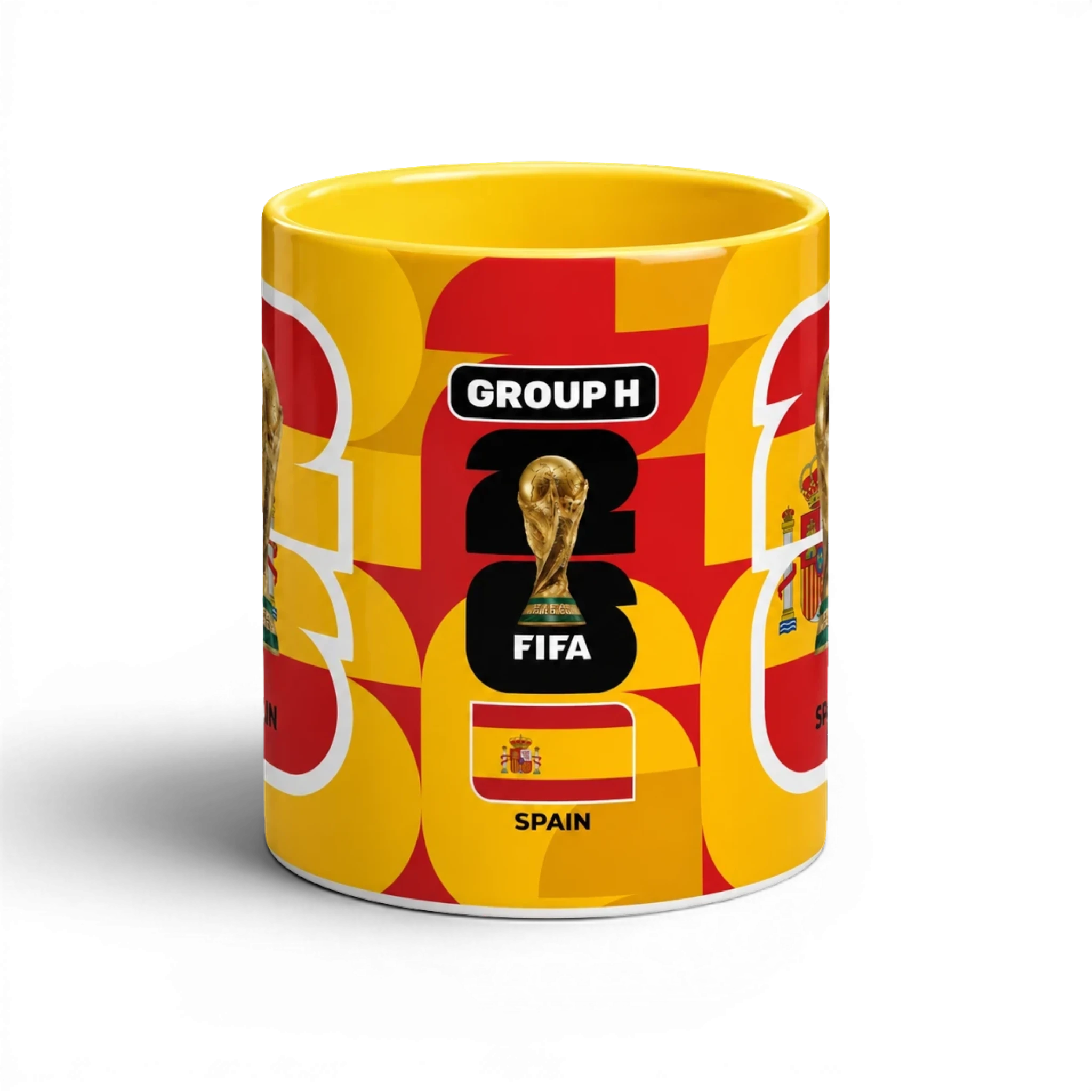 Fann Bliss Spain FIFA World Cup commemorative ceramic mug in red and yellow with trophy and flag design.