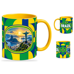 Brazil Mug Yellow – 320ml with yellow handle, showing the landmark side plus companion country-name and centered-flag views of the glossy full-wrap design by Fann Bliss.