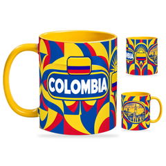 Colombia Mug Yellow – 320ml with yellow handle, showing the country-name side plus companion centered-flag and landmark views of the glossy full-wrap design by Fann Bliss.