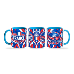 France Mug – 320ml with light-blue handle, shown in three matching angles of the glossy full-wrap design by Fann Bliss.