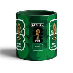 Fann Bliss Saudi Arabia FIFA World Cup 2026 commemorative mug with geometric green pattern, trophy, and national emblem.