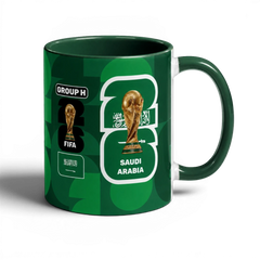 Fann Bliss Saudi Arabia FIFA World Cup 2026 commemorative mug in green with trophy and national emblem.