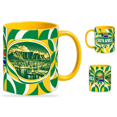 South Africa Mug Yellow – 320ml with yellow handle, showing the landmark side plus companion country-name and centered-flag views of the glossy full-wrap design by Fann Bliss.