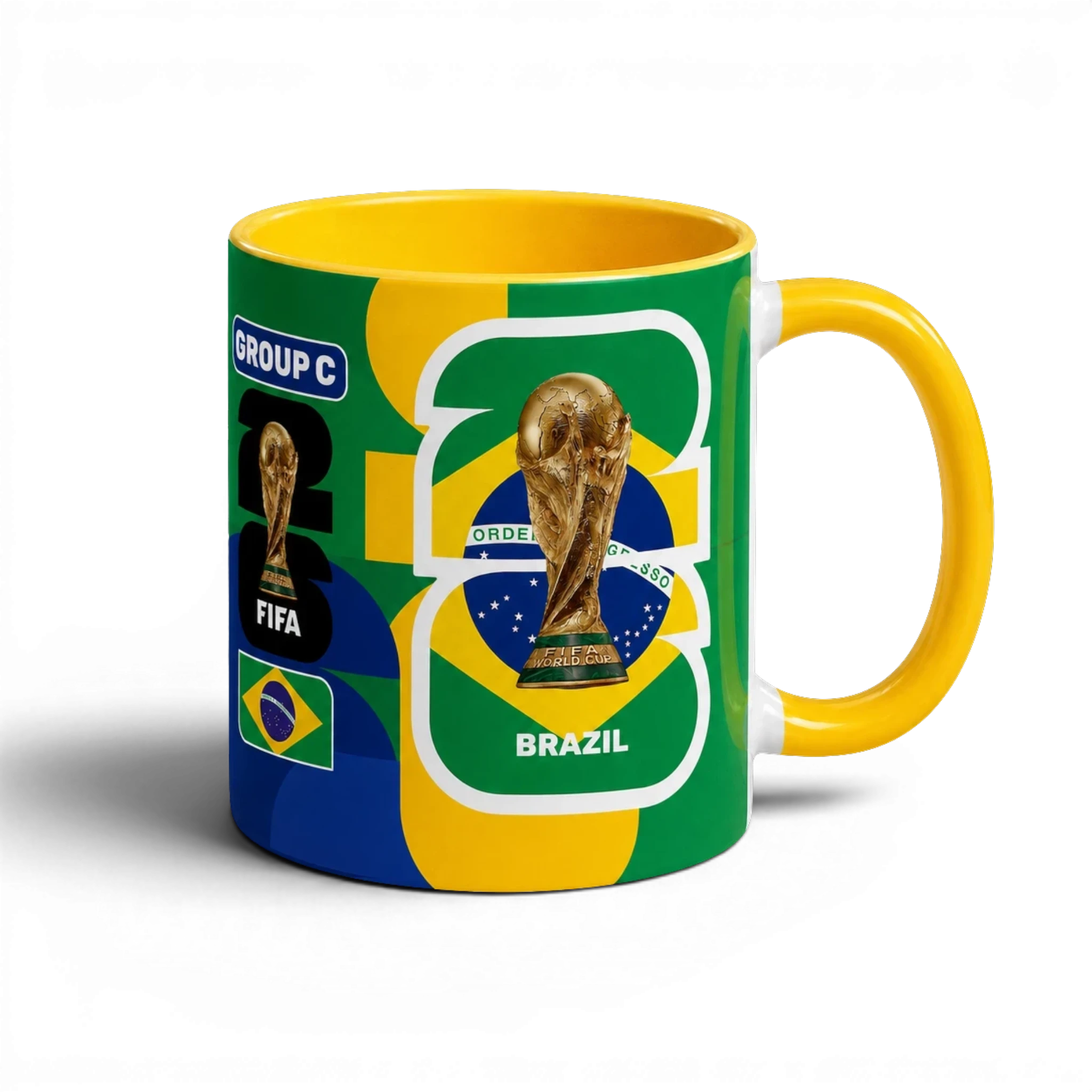 Fann Bliss FIFA World Cup Brazil commemorative ceramic coffee mug with trophy and flag design. Yellow handle and interior.