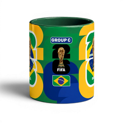 Fann Bliss FIFA World Cup Brazil commemorative ceramic mug with trophy and flag design. Green, yellow, and blue.