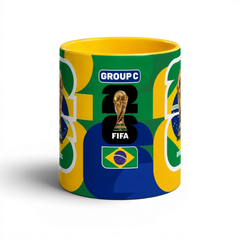 Fann Bliss FIFA World Cup Brazil commemorative coffee mug with trophy and flag design. Ceramic, yellow interior.
