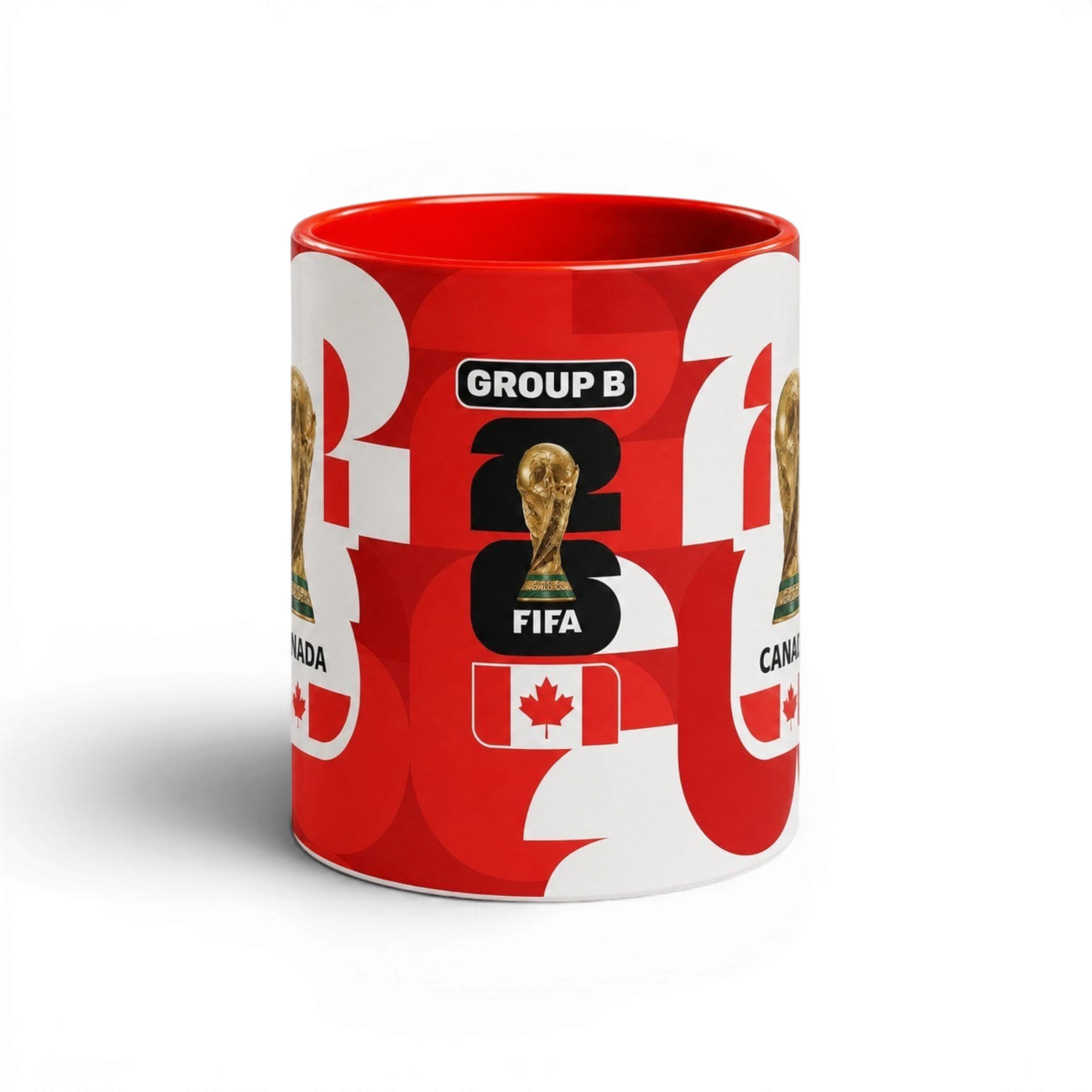 Fann Bliss red and white ceramic coffee mug featuring Canada soccer graphics and the FIFA World Cup trophy.