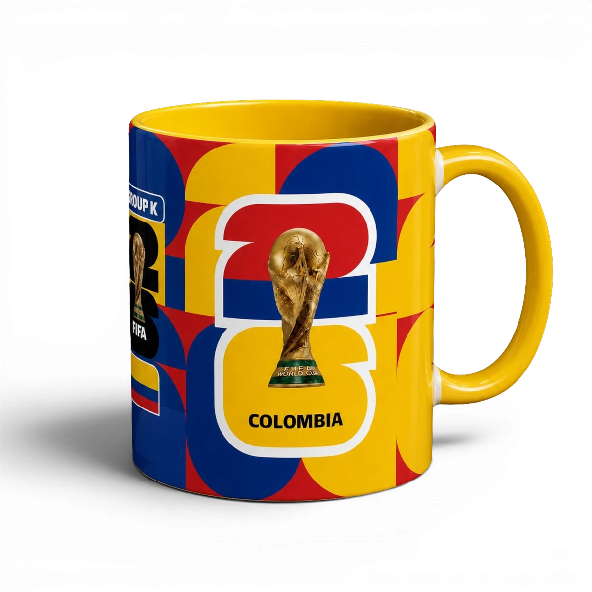 Fann Bliss ceramic mug with Colombia flag colors, FIFA World Cup trophy graphic, and geometric pattern.