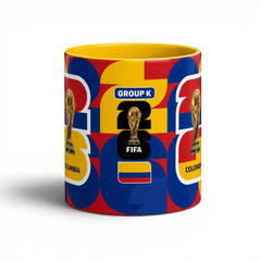 Fann Bliss ceramic mug with Colombia flag colors, FIFA World Cup trophy graphic, and geometric pattern.
