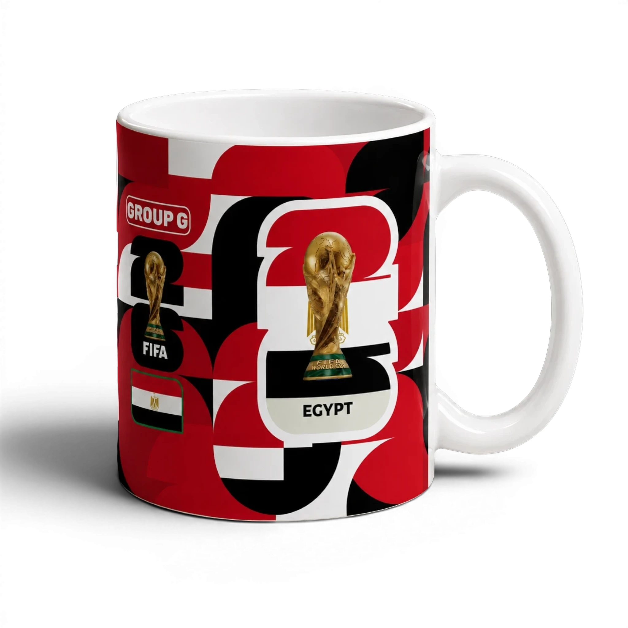 Fann Bliss Egypt World Cup Group G commemorative ceramic mug with FIFA trophy and Egyptian flag graphics in red, black, and white.