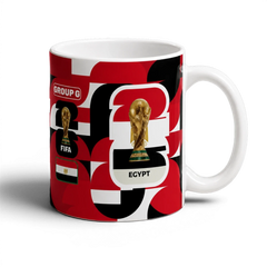 Fann Bliss Egypt World Cup Group G commemorative ceramic mug with FIFA trophy and Egyptian flag graphics in red, black, and white.