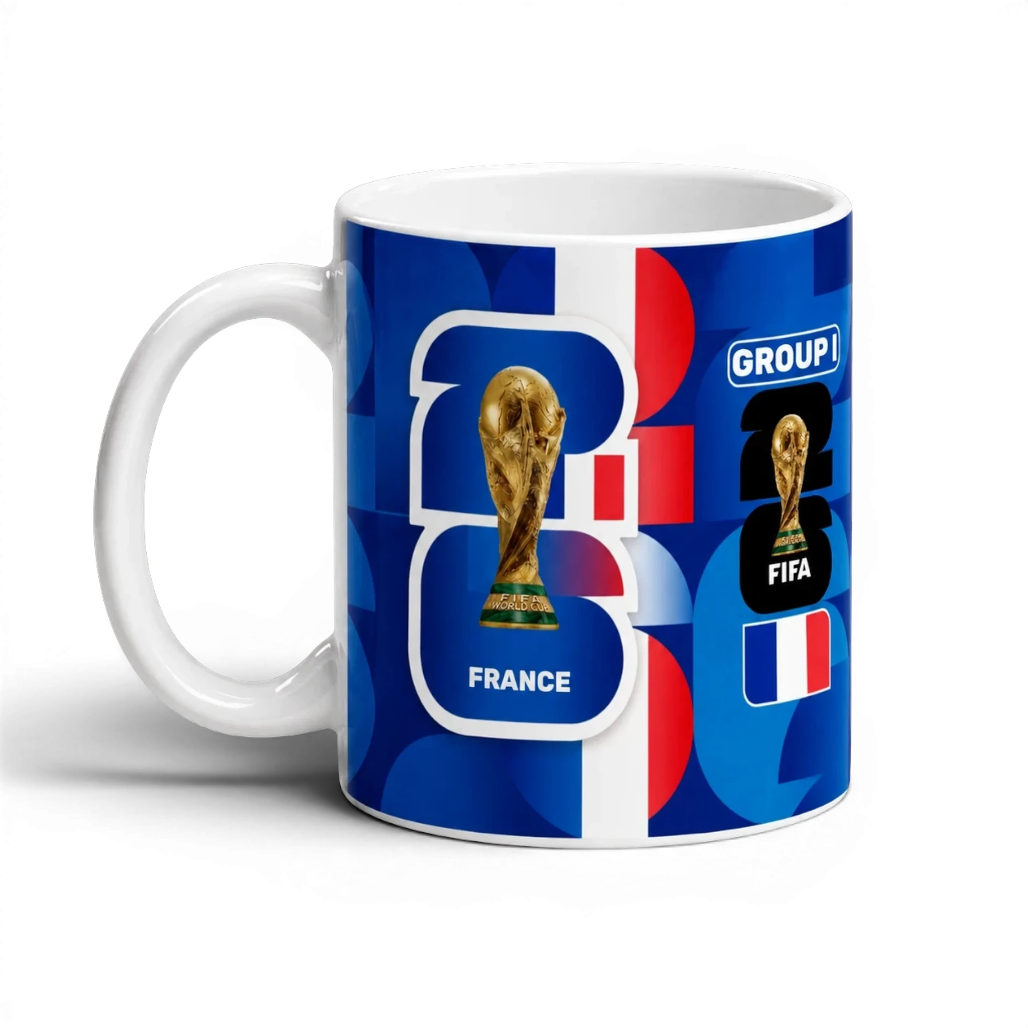 Fann Bliss France FIFA World Cup commemorative ceramic mug with trophy graphic and geometric pattern in blue, white, and red.