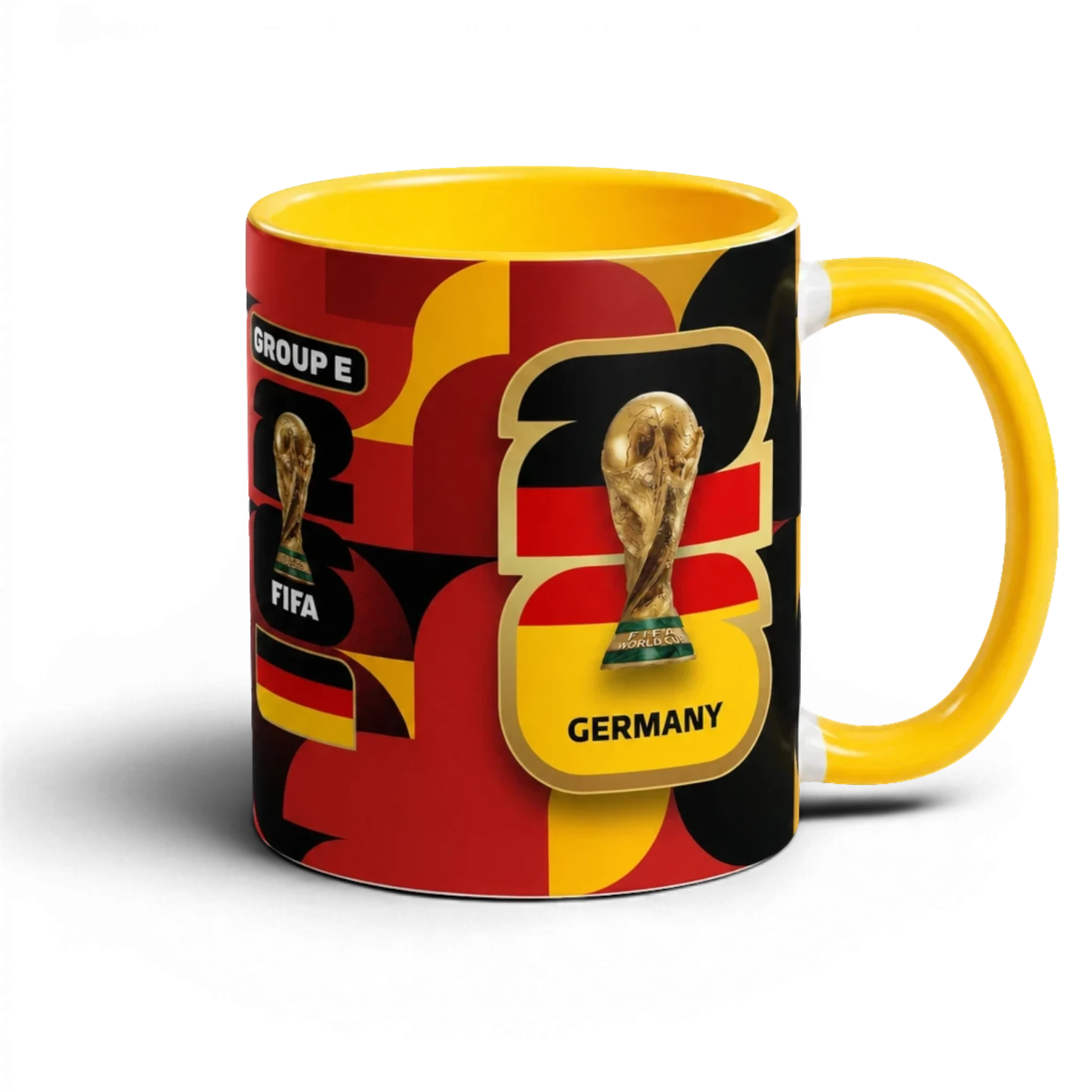 Fann Bliss Germany FIFA World Cup commemorative mug with black, red, yellow geometric design and trophy.