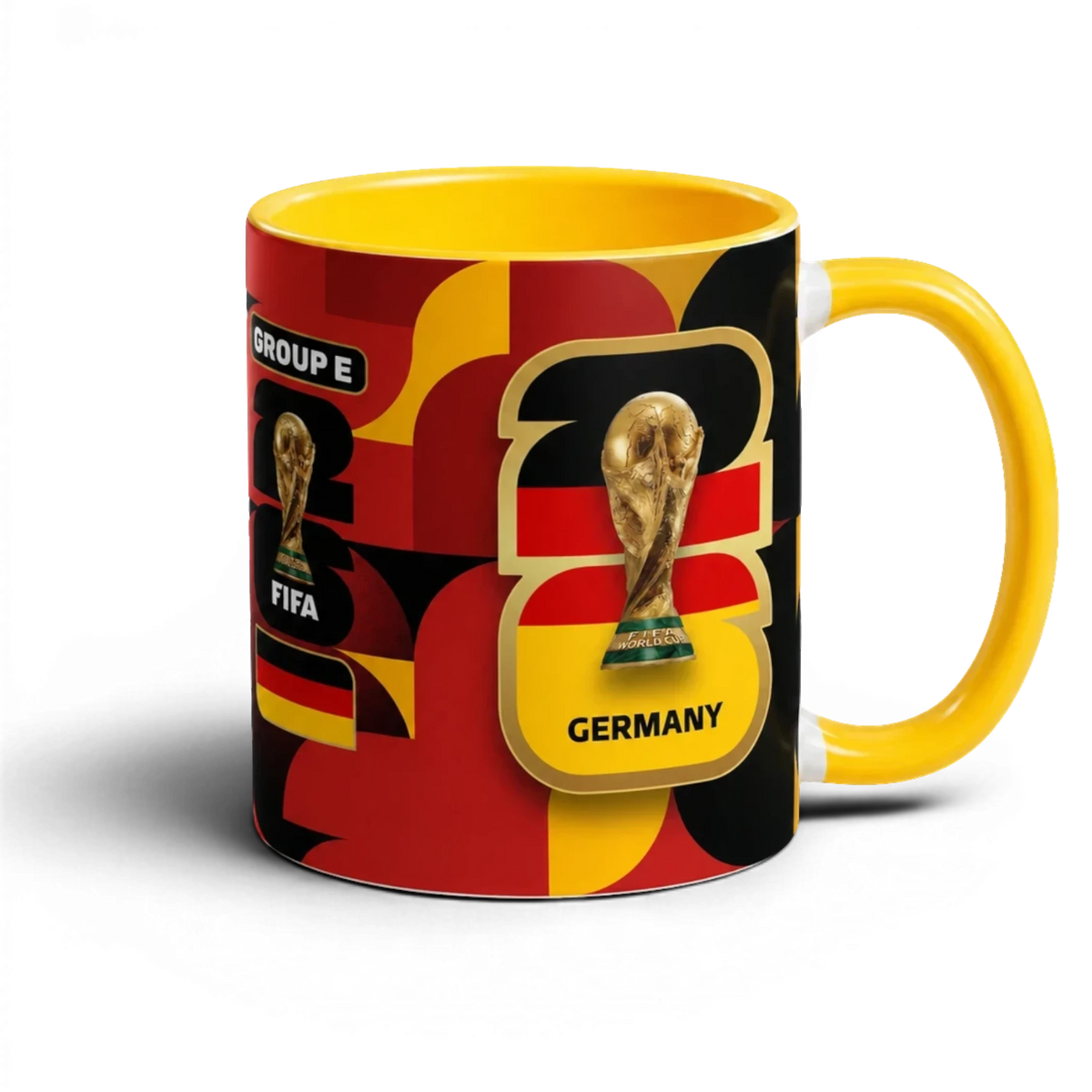 Fann Bliss Germany FIFA World Cup commemorative mug with black, red, yellow geometric design and trophy.
