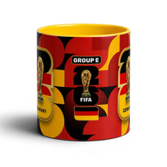 Fann Bliss Germany FIFA World Cup commemorative mug in black, red, and yellow with trophy graphic.