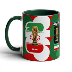 Fann Bliss Iran World Cup ceramic coffee mug featuring the FIFA trophy and national flag in green, white, and red.