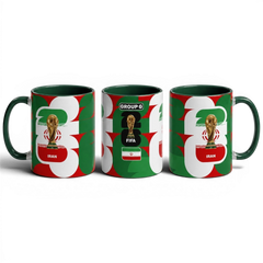 Fann Bliss ceramic coffee mug featuring the Iran flag and World Cup trophy graphic in green, white, and red colors.