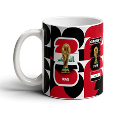 Fann Bliss Iraq World Cup Trophy ceramic coffee mug with Iraqi flag and bold red, black, and white graphic pattern.