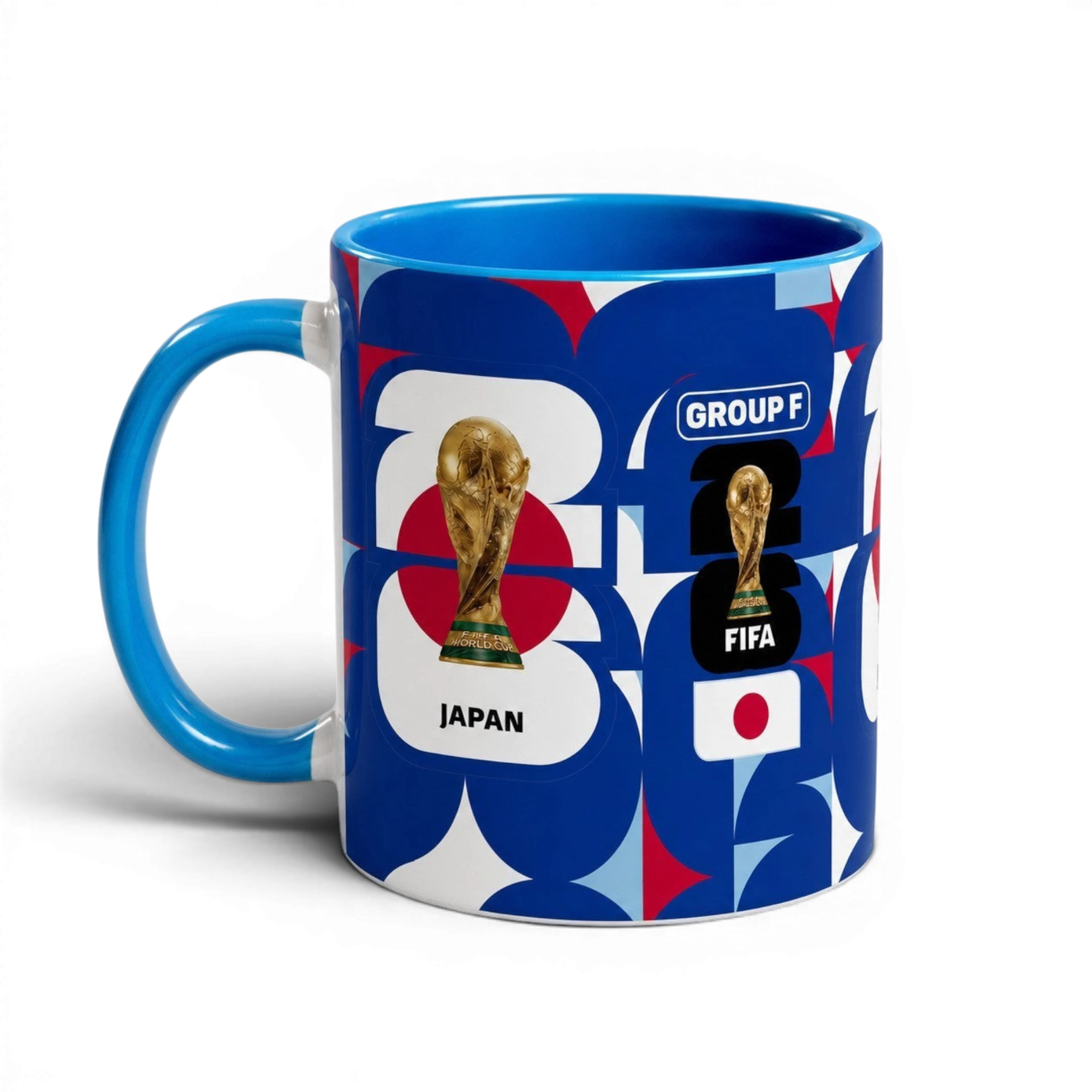 Fann Bliss ceramic coffee mug featuring Japan World Cup trophy, geometric blue, red, and white pattern.