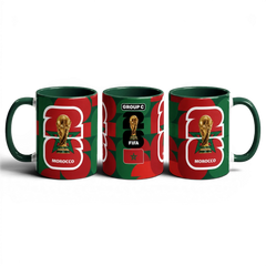 Fann Bliss Morocco World Cup 2026 commemorative ceramic coffee mug in green and red with FIFA trophy and "GROUP C" detail.