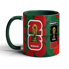 Fann Bliss Morocco World Cup 2026 commemorative ceramic mug with green and red design, FIFA trophy, and "GROUP C" text.
