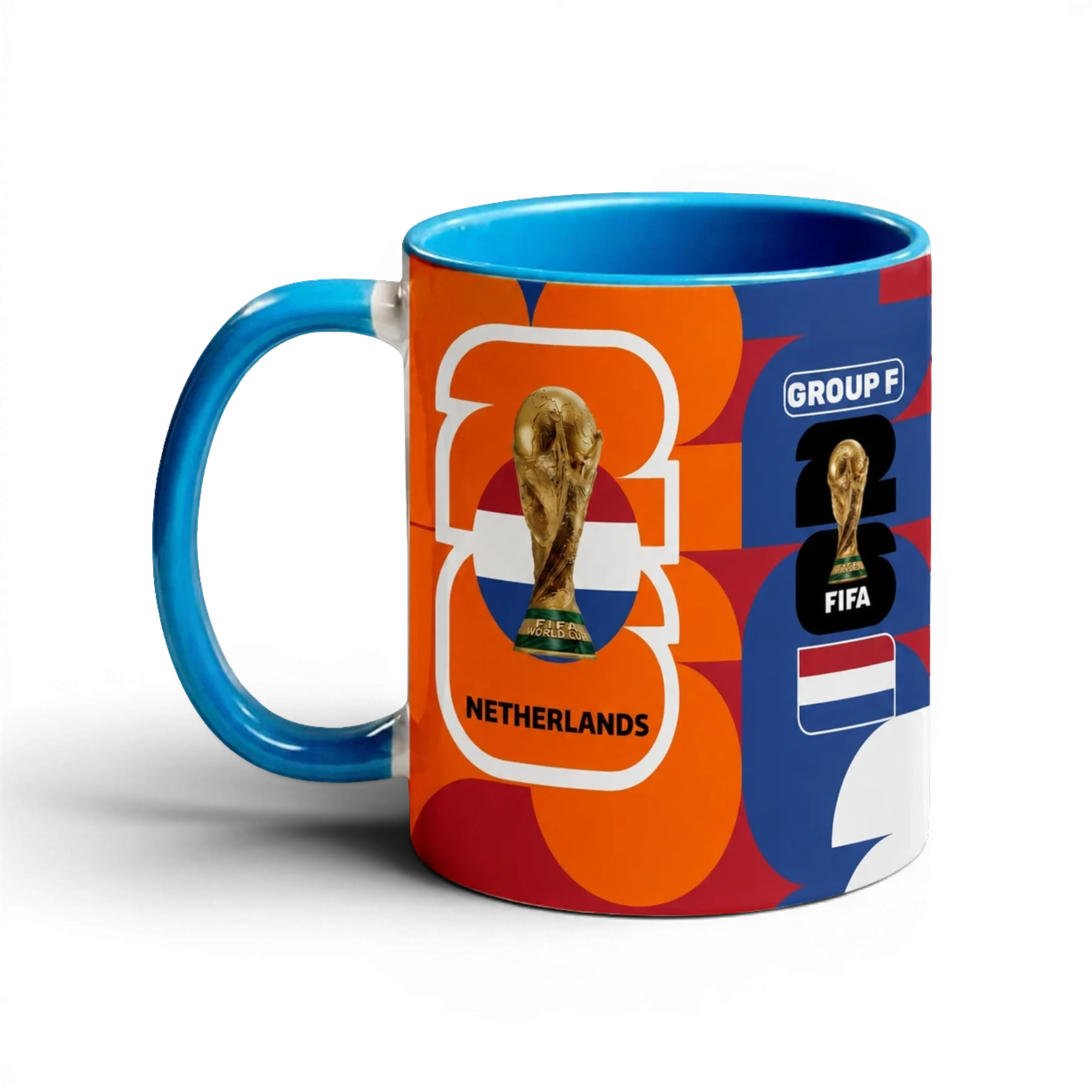 Fann Bliss Netherlands World Cup commemorative ceramic coffee mug with orange, blue, and white abstract pattern, FIFA trophy, and flag.