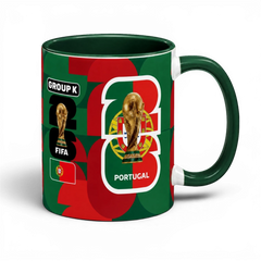 Fann Bliss Portugal FIFA World Cup commemorative mug in green and red with trophy graphics and geometric pattern.