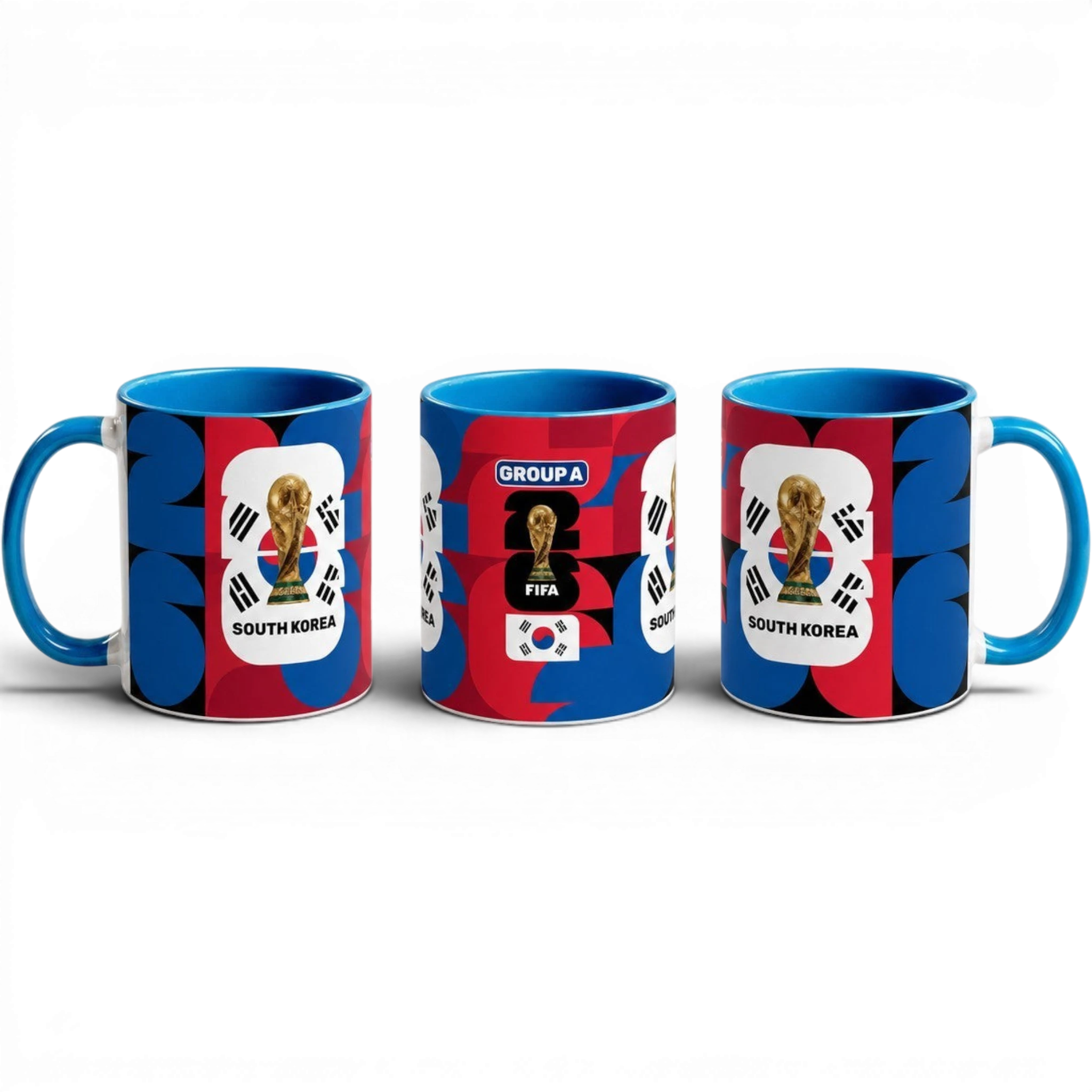 Fann Bliss South Korea World Cup ceramic mug with trophy graphic, blue interior, and geometric red and blue pattern.