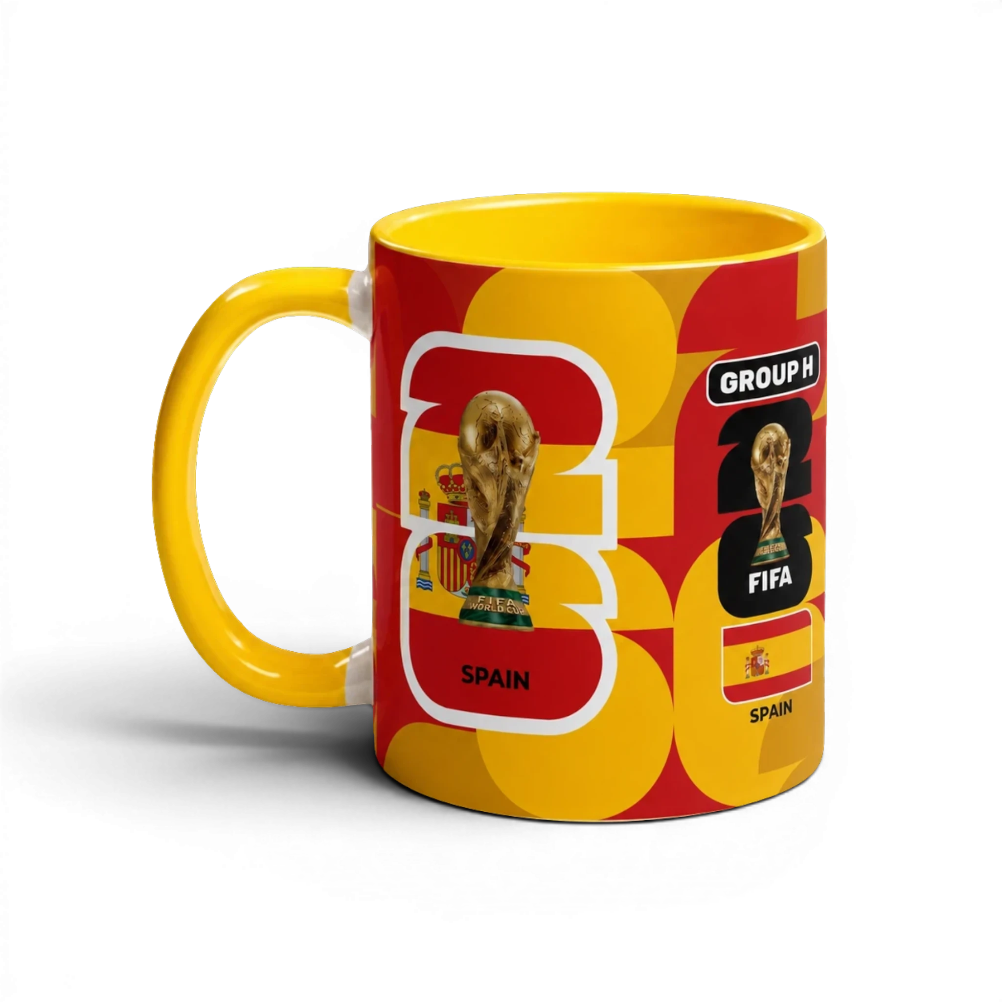 Fann Bliss Spain FIFA World Cup commemorative ceramic mug in red and yellow with trophy and flag graphics.
