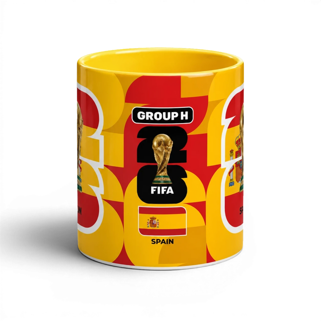 Fann Bliss Spain FIFA World Cup commemorative ceramic mug in red and yellow with trophy and flag design.