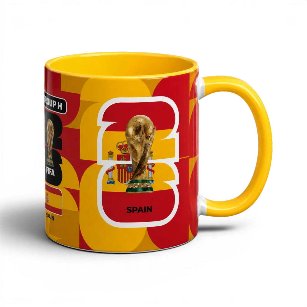 Fann Bliss Spain FIFA World Cup commemorative ceramic mug in red and yellow with trophy and flag design.