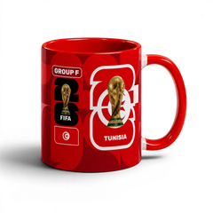 Fann Bliss Tunisia FIFA World Cup 2026 commemorative mug. Red ceramic with trophy, flag, and team details.