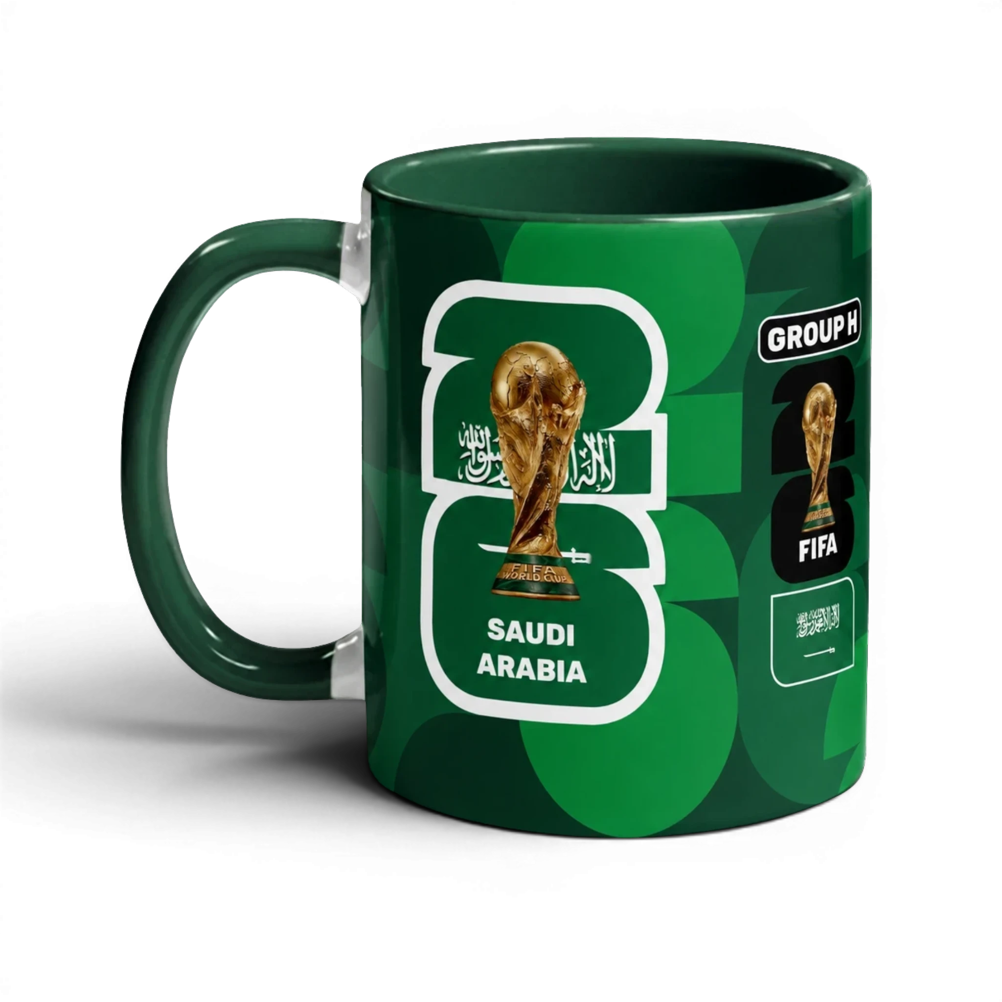 Fann Bliss Saudi Arabia FIFA World Cup 2026 commemorative mug with green geometric pattern, trophy, and national emblem.