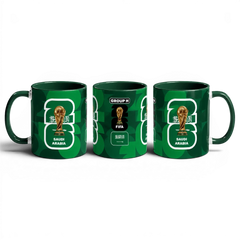 Fann Bliss Saudi Arabia FIFA World Cup 2026 commemorative mug in green ceramic with geometric pattern, trophy, and team emblem.